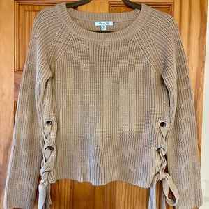 Pretty she + sky spring sweater with grommets and ties